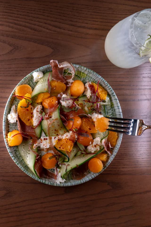 Melon salad with cucumber and prosciutto