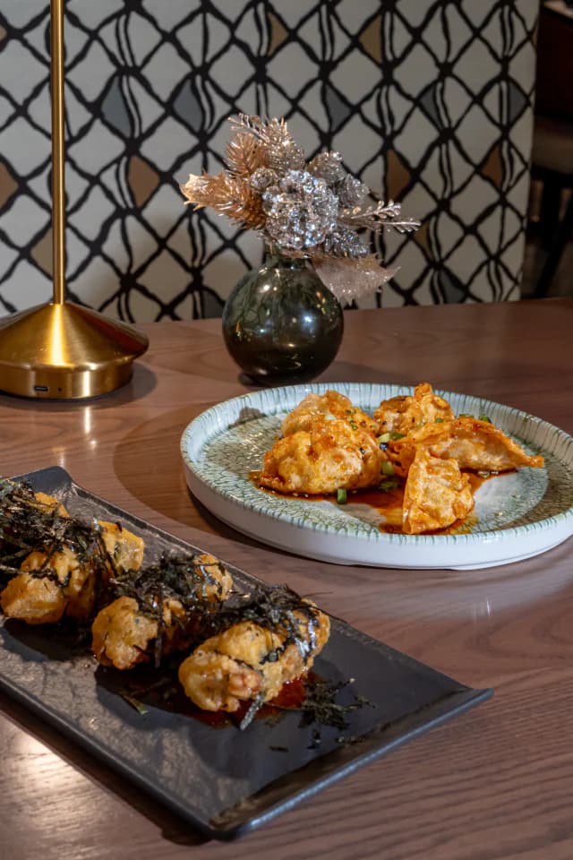 A spread of tapas-style plates on the table