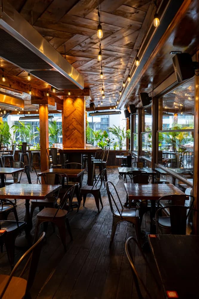 The wood-clad dining room at Zócalo at dusk